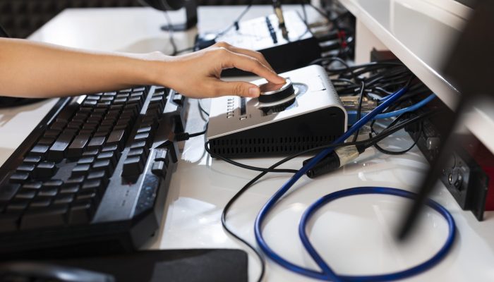 young-woman-working-radio-with-professional-equipment